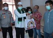 Penggali kubur, Pemandi Jenazah, Pengurus Gereja dan Masjid Terima Bansos dari Polres Tapteng