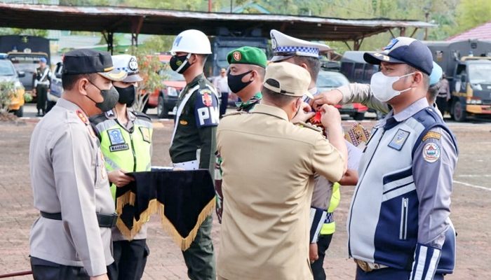 Pj Bupati Tapteng Hadiri Apel Gelar Pasukan Operasi Lilin Toba 2022