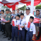 Pemkab Asahan Bagikan 5.250 Bendera Merah Putih untuk Tingkatkan Semangat Nasionalisme